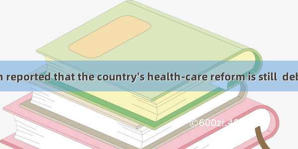 35. It has been reported that the country's health-care reform is still  debate.A. inB. on
